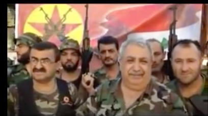 Türkisch-alawitischer Milizchef Mihrac Ural mit Gefolgsleuten